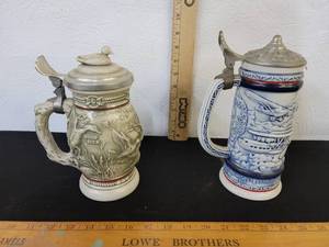 lot 336 image: AVON Ducks Of The American Wilderness Stein And AVON Planes Stein