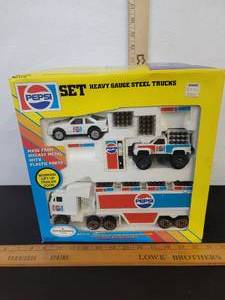 lot 438 image: Pepsi Set Heavy Gauge Steel Trucks