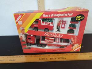 lot 441 image: Coca-Cola Buddy L Brute 15 Piece Coke Truck