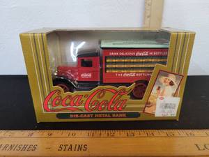 lot 442 image: Coca-Cola Die-Cast Metal Bank