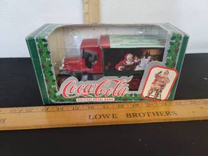 lot 443 image: Coca-Cola Christmas Die-Cast Metal Bank