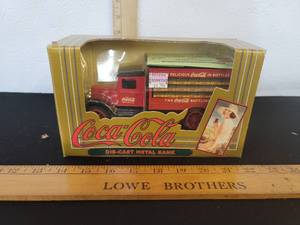 lot 444 image: Coca-Cola Die-Cast Metal Bank