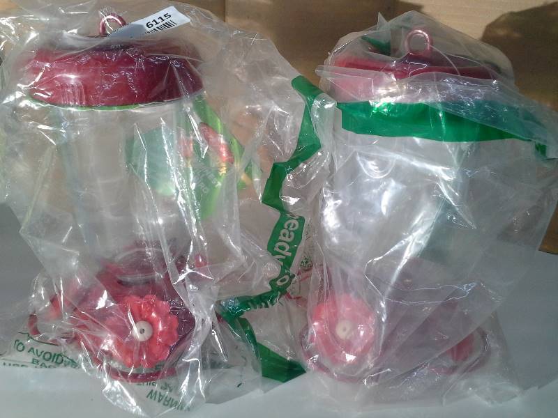lot 6115 image: Perky Pet Humming Bird Feeders (plastic) - 2 feeders