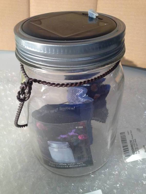 lot 6136 image: Moonrays 91588 Solar Powered Decorative Jar Light LED Light, White