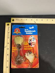 lot 1012 image: Vintage 1996 Looney Tunes Tasmanian Devil Flip-Up Toothbrush Holder w Suction