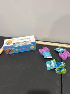 lot 1044 image: Bundle of Fidget Toys - New Ball-Shape Toy & 3 Mini Pop It