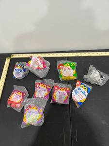 lot 1048 image: Bundle of 9 Happy Meal Toys from the 90s