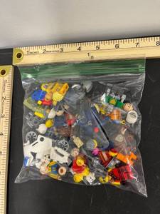 lot 1101 image: Sandwich Bag Full of Lego Mini Figures Parts (Figures May Not be Complete Sold As-Is)