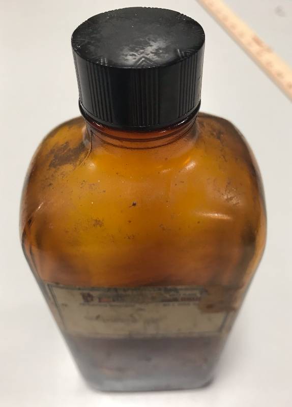 lot 1020 image: Old Glass Pharmacy Bottle with Lid
