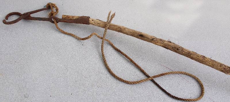 lot 4370 image: Hog Leash  Grabber    Not something as seen on TV Wood Handled