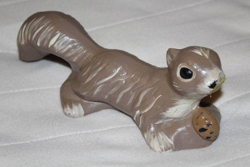 lot 4696 image: Cement Squirrel - Has holes in bottom to hang on tree