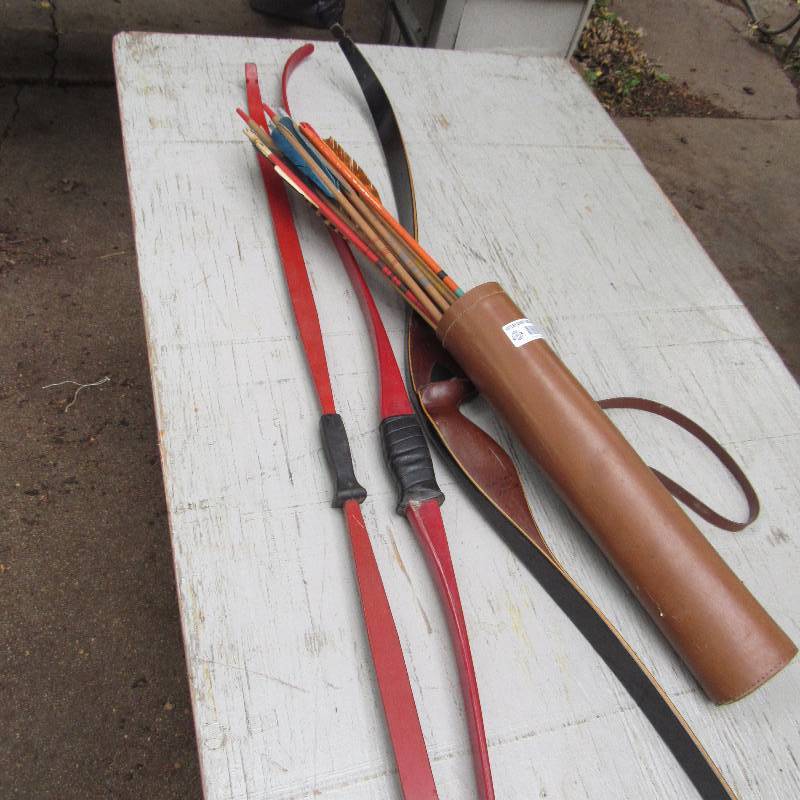 lot 6036 image: 3 bows, quiver and 1 dozen arrows (bows missing strings)