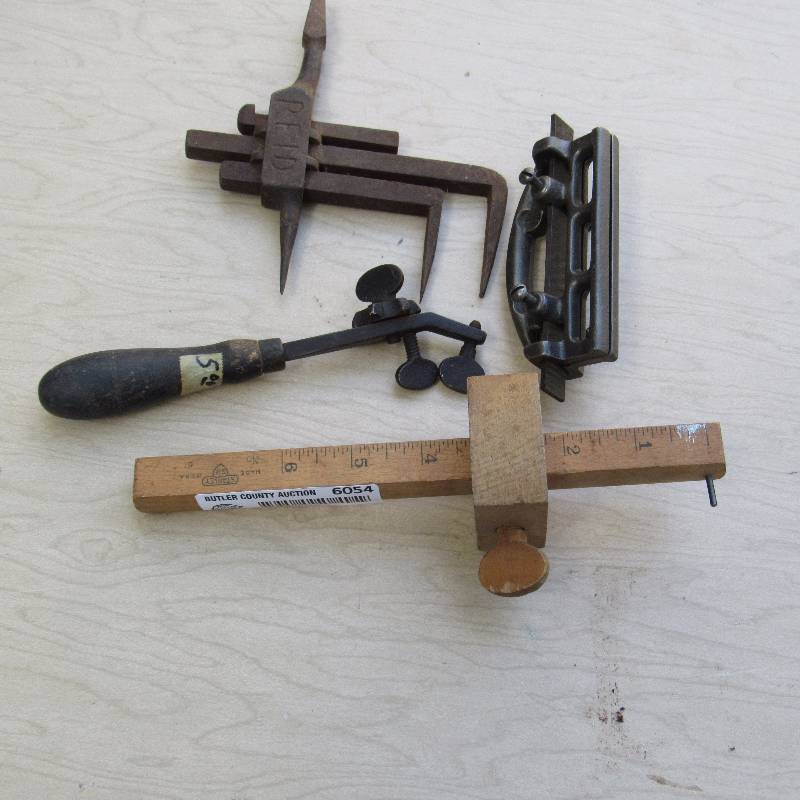 lot 6054 image: Lot of 4 Misc tools - Wooden Scribe, Reid Hand Operated Wood Brace Attachment, Wooden Handle Tool, Small File Clamp Piece See photos