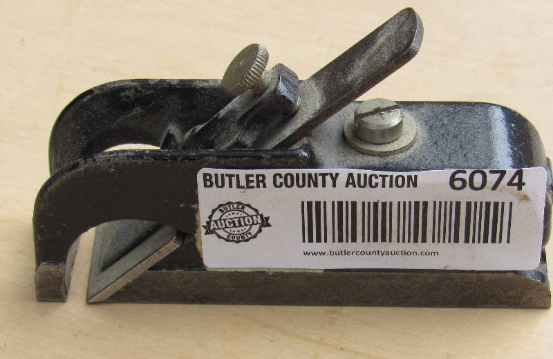 lot 6074 image: Small Wood Plane - just a little over 4 long - Blade marked Stanley