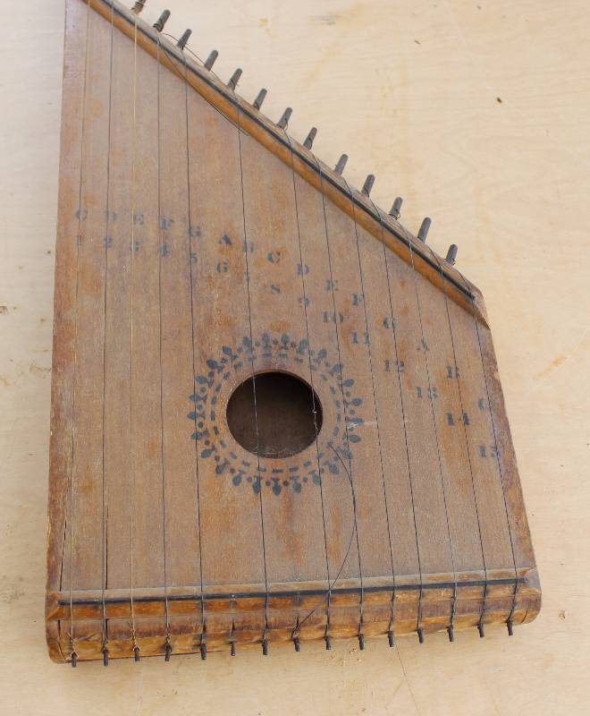 lot 2300 image: Wooden String Instrument - COOL - See photos (note one string is broken)