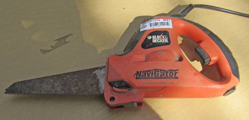 lot 4643 image: Black and Decker Navigator - Power Chain Saw  Jig Saw - appears to be in good working condition