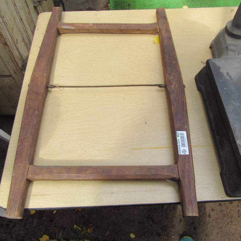 lot 4667 image: Vintage Saw - Wooden Handles blade in the middle