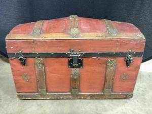 lot 11 image: Very Old Wood wCasters, Camel-Back Trunk with Ornate Metal Accents - Decoupaged with Old Magazine Pictures Inside