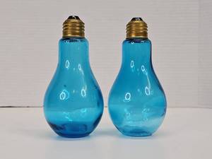 lot 365 image: Pair 1970s Nissan Blue Glass Light Bulb Salt & Pepper Shakers