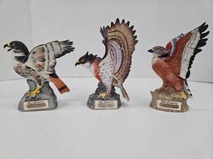 lot 372 image: 3 Ski Country Miniature Hawk Decanters with Flaws