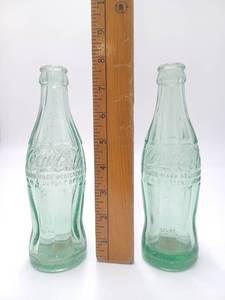 lot 425 image: Lot of 2 Vintage Green Glass Coca-Cola Bottles - Made in Sioux City Iowa & Great Bend Kansas
