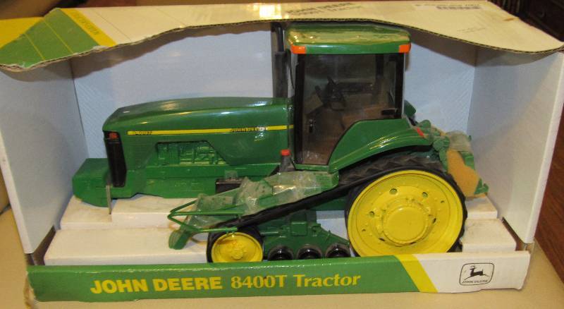 lot 7001 image: John Deere - 8400T - Tractor in original box, 116 scale replica toy - Quality Die Cast Metal Collectors Edition Cab w windows