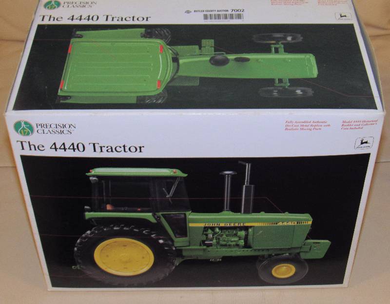 lot 7002 image: John Deere Model 4440 Tractor, Precision Classics - In original box Excellent Condition Metal Collectors Medallion Included