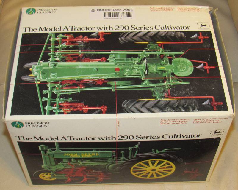 lot 7004 image: John Deere - Model A Tractor w 290 Series Cultivator - Toy Replica in Original Box - Pristine Condition - Collectors Medallion Included
