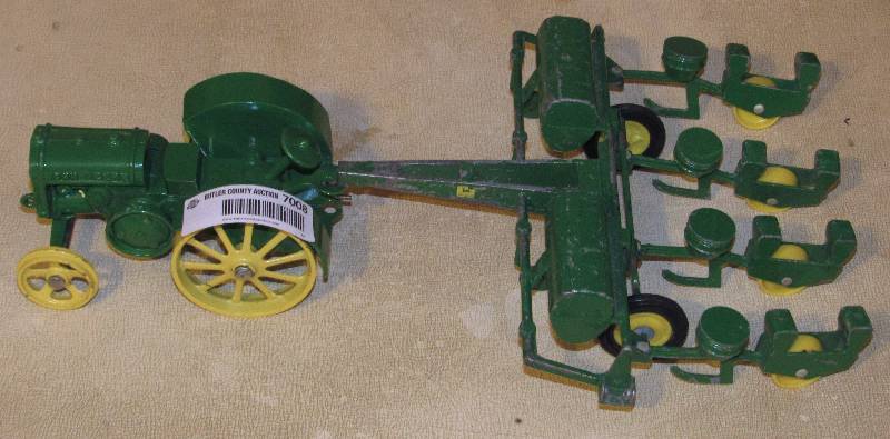 lot 7008 image: John Deere Tractor - Metal Toy Replica w Plow - Minor Scratches, Detachable Plow - see photos