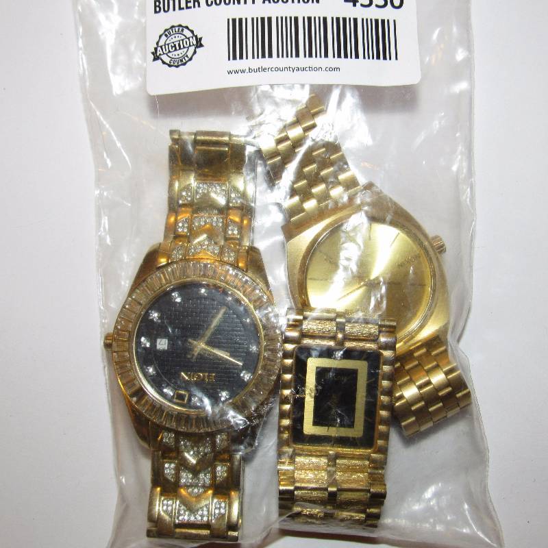 lot 4550 image: Lot of 3 Mens Watches - 1 Noxin, Bulova w diamond minor scratches on face, Elgin missing stone - see photos
