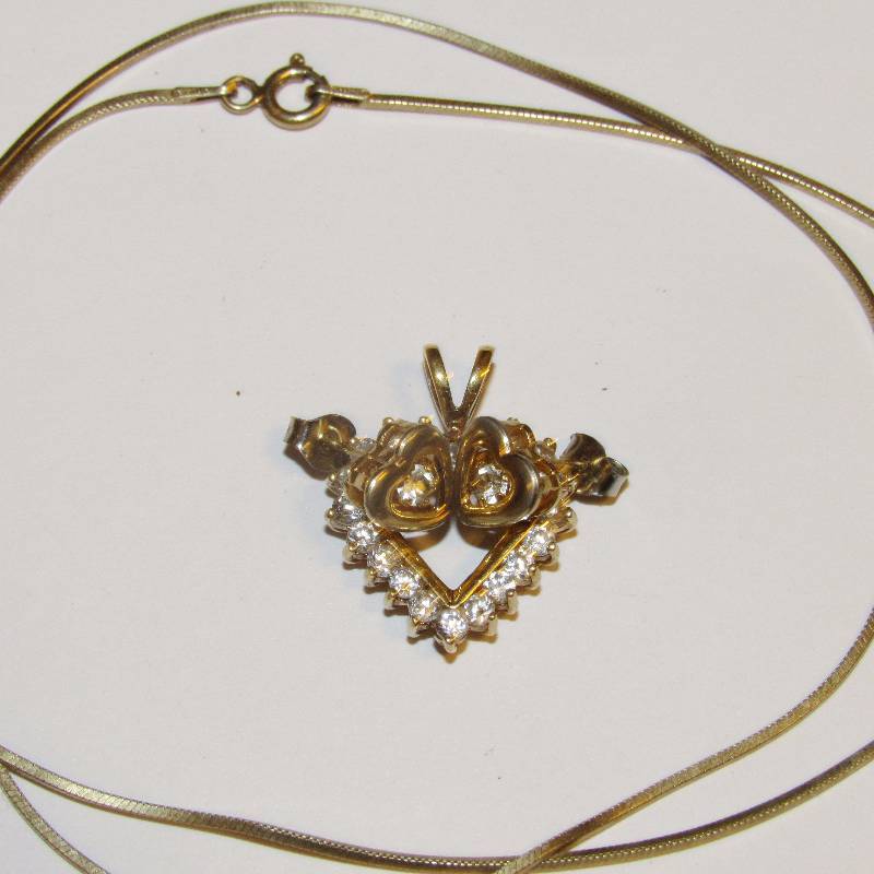 lot 4554 image: Lot of Jewelry - Gold Necklace and other Heart Shaped Pendant Marked 925 & CC