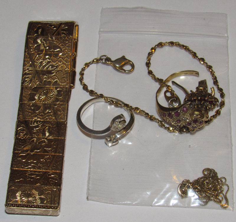 lot 4559 image: Lot of Jewelry - Gold 14K Necklace - broken (1.00 gram) - the rest is costume - Nice Bracelet, Thin Gold Bracelet, Tiger Ring, Broken Ring