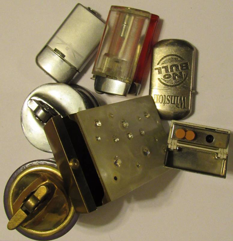 lot 4567 image: Lot of Smoking Accessories - 7 Cigarette Lighters and 1 Decorative Cigarette Case
