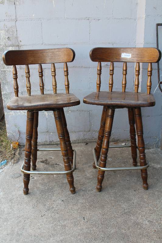 lot 6218 image: Lot of 2 - Bar Stools - 24 wood swivel tall seats - see photos