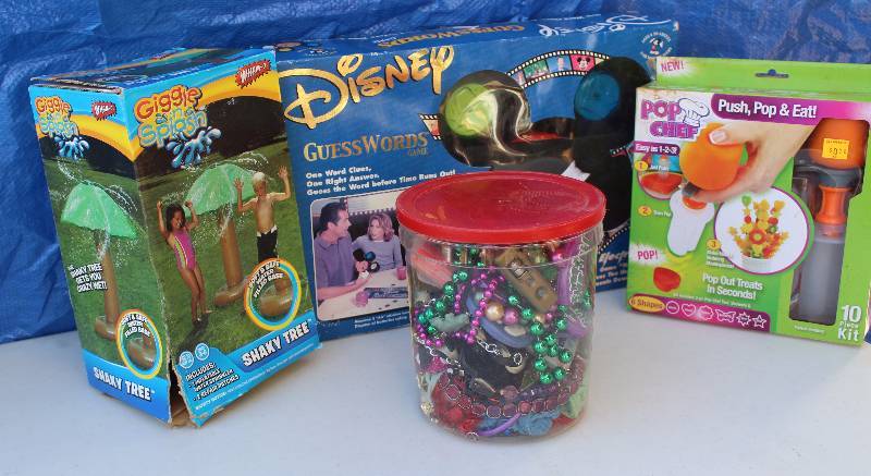 lot 6126 image: Lot of Toys and Games - Disney Guess Words - Giggle Squiggle Sprinkler and More See photos