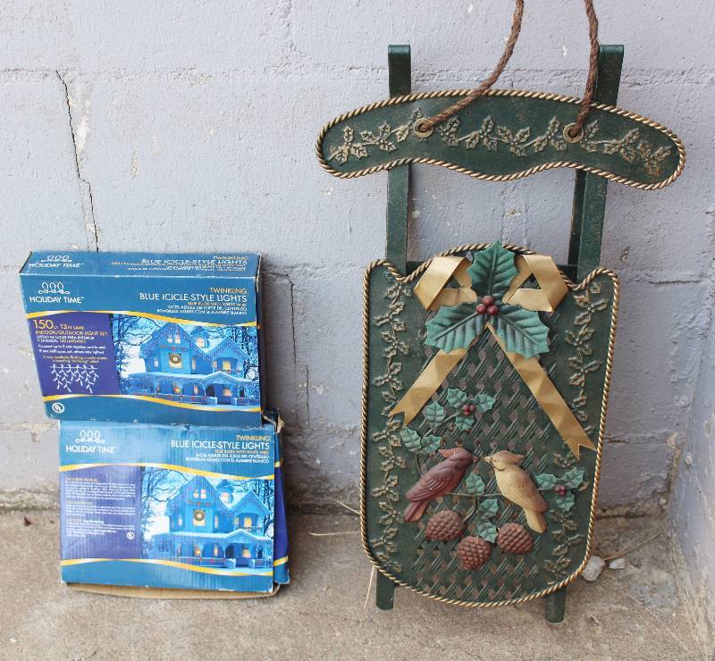 lot 6226 image: Lot of Christmas Decor - Decorative Sled and 2 boxes of icicle lights