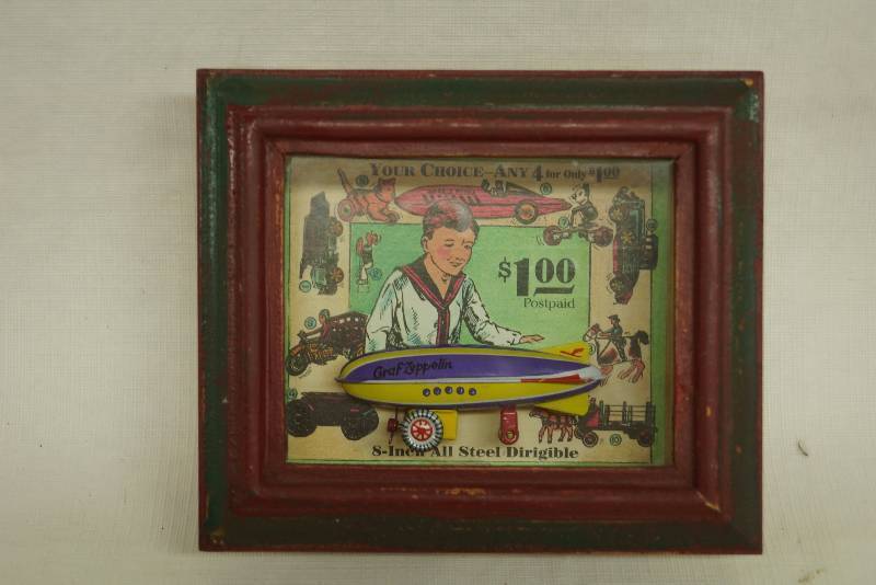 lot 1146 image: Vintage Toy Graf Zeppelin - In a cool framed shadow box