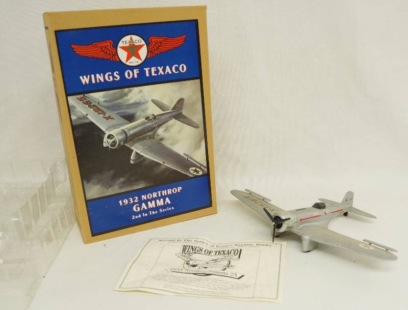 lot 1192 image: ERTL - Metal Die Cast - Airplane Coin Bank - Wings of Texaco - 1932 Northrop GAMMA - w original box and papers #B223