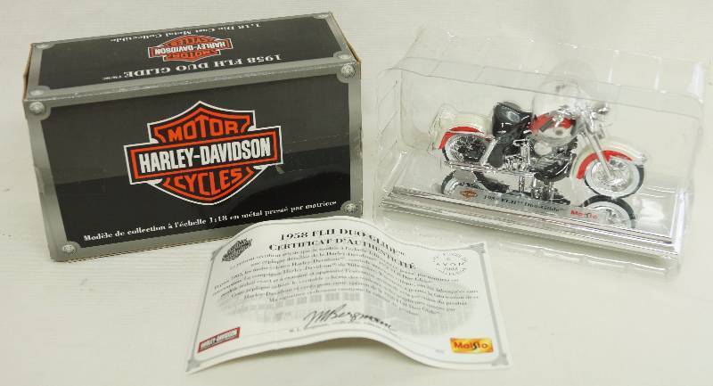 lot 1250 image: HARLEY-DAVIDSON MOTORCYCLES - 1958 FLH Duo-Glide  - Maisto 118 Die Cast Metal Replica Model - with box & paperwork