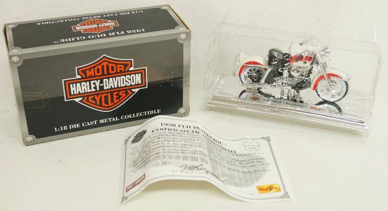 lot 1254 image: HARLEY-DAVIDSON MOTORCYCLES - 1958 FLH Duo-Glide  - Maisto 118 Die Cast Metal Replica Model - with box and paperwork