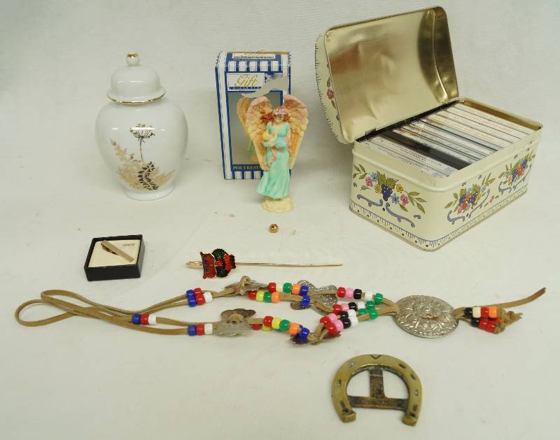 lot 1293 image: Lot of Goodies Ginger Pot, Lucky Horseshoe Belt Buckle, Tie Clip, Owl Bookmark - Cassette Tapes and more