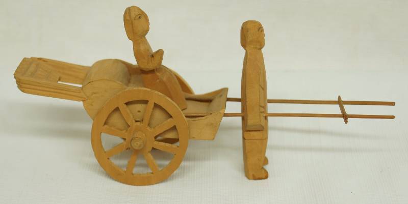 lot 4795 image: Tiny Wooden Oriental Princess on a Rickshaw w foot soldier pulling her - wheels turn Unique  neat piece