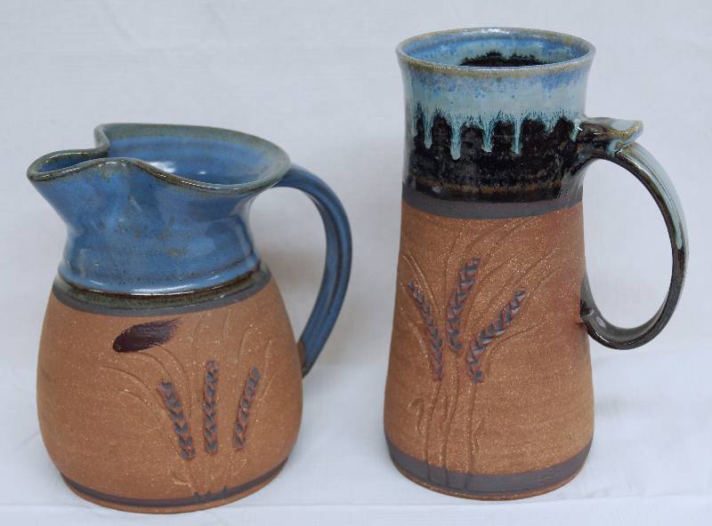 lot 4836 image: Lot of 2 - Artwork Stoneware Pottery by Steve Ashley - 1985 & 1996 Copper Color, and Blue Wheat Design - WOW