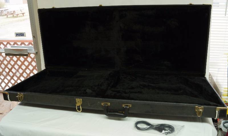 lot 6164 image: Nice DEAN Electric Guitar Hard Case w key for unique explorer shaped guitar - See photos