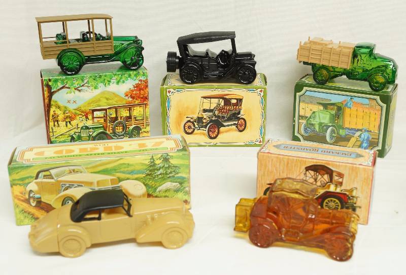 lot 6165 image: Lot of 5 Vintage Avon bottles w original boxes - Car Series - Most still have the cologne in them