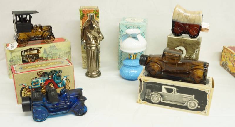 lot 6166 image: Lot of 6 Vintage Avon bottles w original boxes - Car Series & More - Most still have the cologne in them