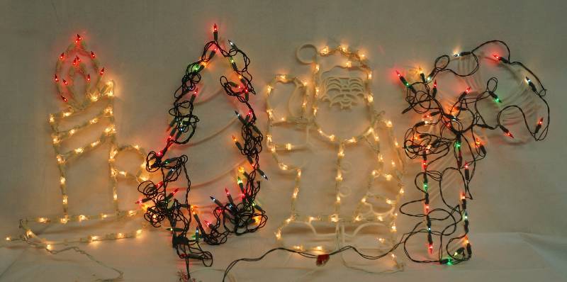 lot 6204 image: Lot of 4 X-Mas Light Frames w lights Candle, Tree, Santa, Candy Cane - all work