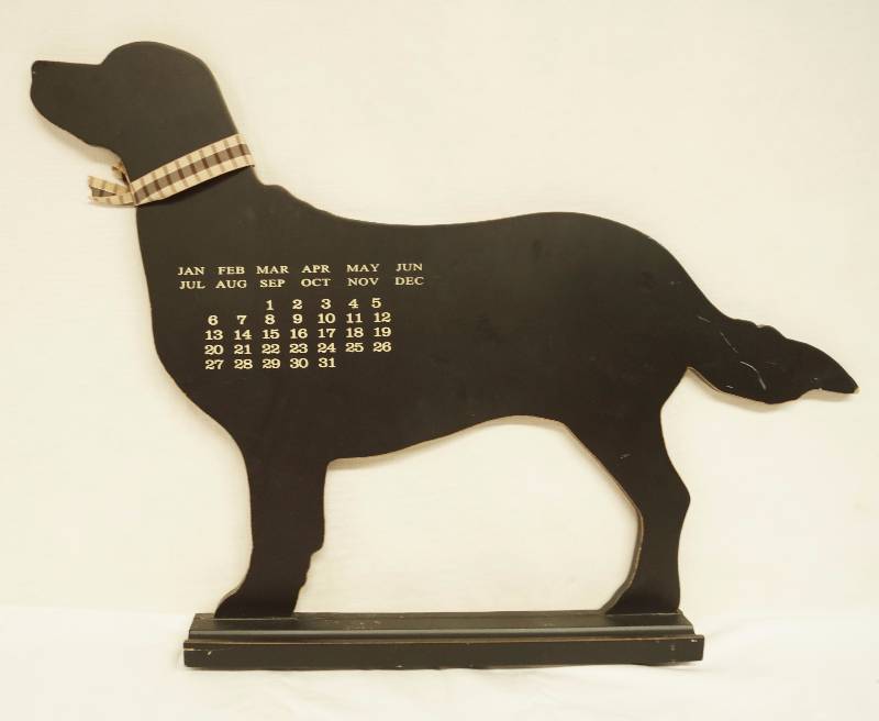 lot 6285 image: Neat DOG Wall Calendar Hanger