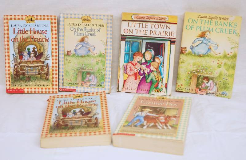 lot 6303 image: LAURA INGALLS WILDER - BOOK COLLECTION - Little House on the Prairie - Little Town - On The Banks - Farmer Boy