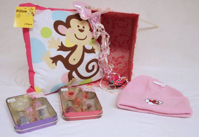 lot 6323 image: Kansas City Chiefs Hat - Monkey Pillow and 2 Gift Sets